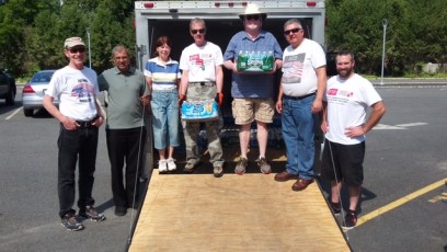 St Virgil’s Church, Morris Plains yields generous summer outreach water drive L to R Jim, Fr Lance and Jane from parish, Ray, John, Tony and Tom