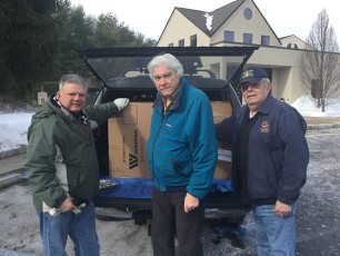 MAJ Tony Destefano receives generous gift of new warm clothing for winter outreach from NJ Elks Army of Hope veterans team.
