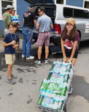 OCO Team delivering cases of water to Safe Harbor homeless services center in Easton, PA.