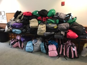 125 filled winter backpacks in Morristown for winter outreach.