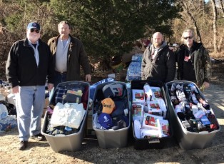 Winter Outreach with cases of new warm clothing delivered to the Howell encampment. John Hennessey, Rev Steve Brigham, Mark Voorhees, Deacon Ray.