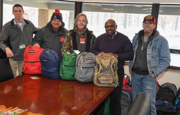 Outreach team delivers new warm clothing to 76 residents at Veterans Haven (South) Hammondton, NJ. Sgt. William Lobach, Assnt. Superintendent ; Tony; Ray; Colonel Walter Hall, Superintendent; Doug Walters USMC.