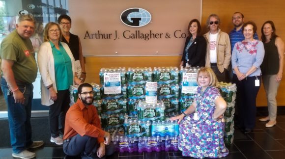 Thank you to the AJ Gallagher team with monetary contributions and 35 cases of life saving water for the summer homeless outreach campaign.