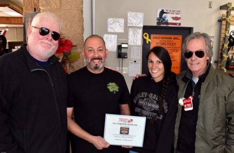 John and Ray with Shoreline Harley Davidson team collecting 125 backpacks!